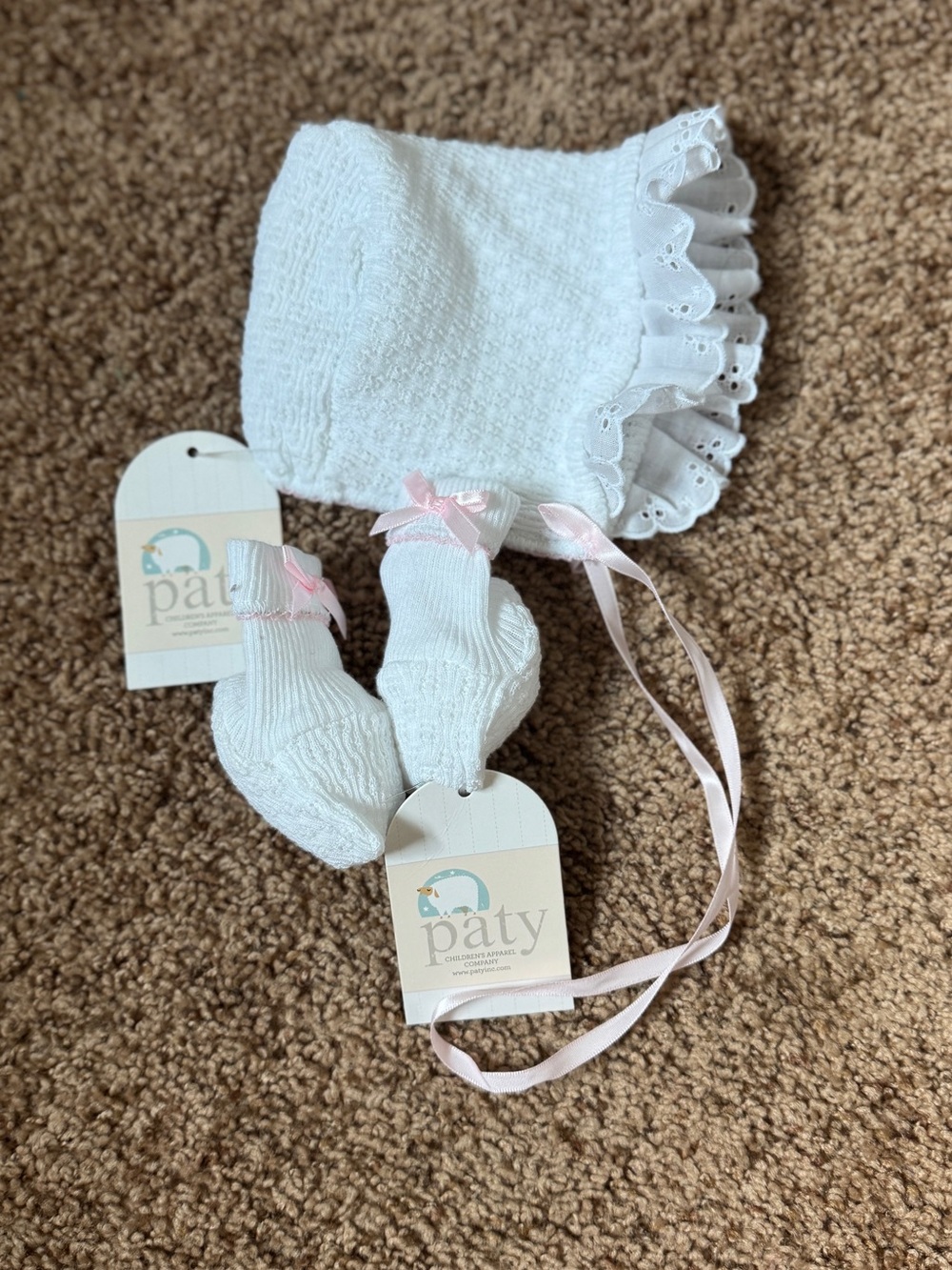 Paty White Lace Baby Bonnet with Pink Ribbon Accents
